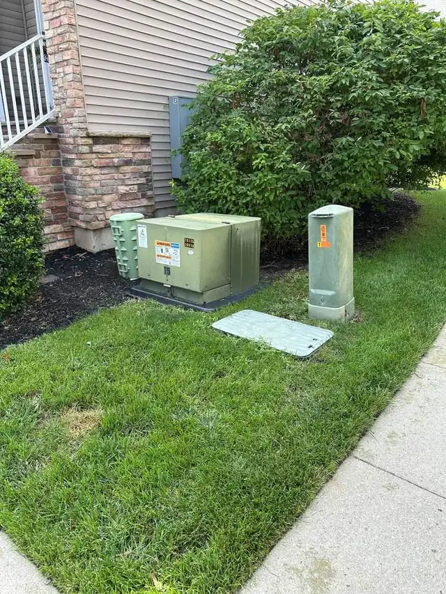Clean grass around utility areas after PooGO pet waste removal service